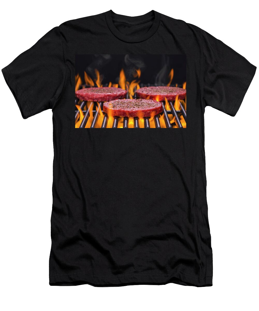 Raw Hamburgers Seasoned with Salt and Pepper on a Flaming Barbecue Brian Enright T-Shirt